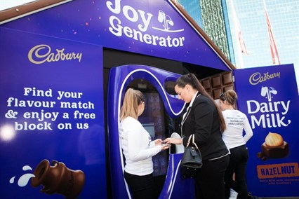 Red Agency has created the world’s first Facebook flavour-matching vending machine. Via Facebook, users receive their personalised Cadbury chocolate flavour match based on their likes and interests, before getting their picture taken in the running picture booth “The Joy Generator.” ©Photo:BandtAustralia 