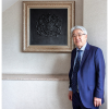 president mr shintaro fukuda with 100 annual plate which was presented by manroland sheetfed gmbh